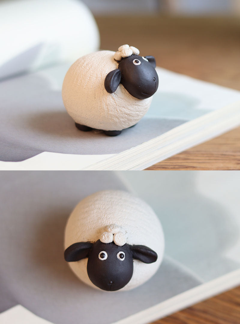 "A pair of cute little sheep" sculpture