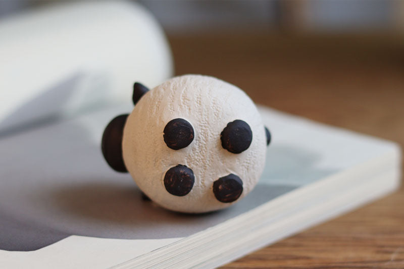 "A pair of cute little sheep" sculpture